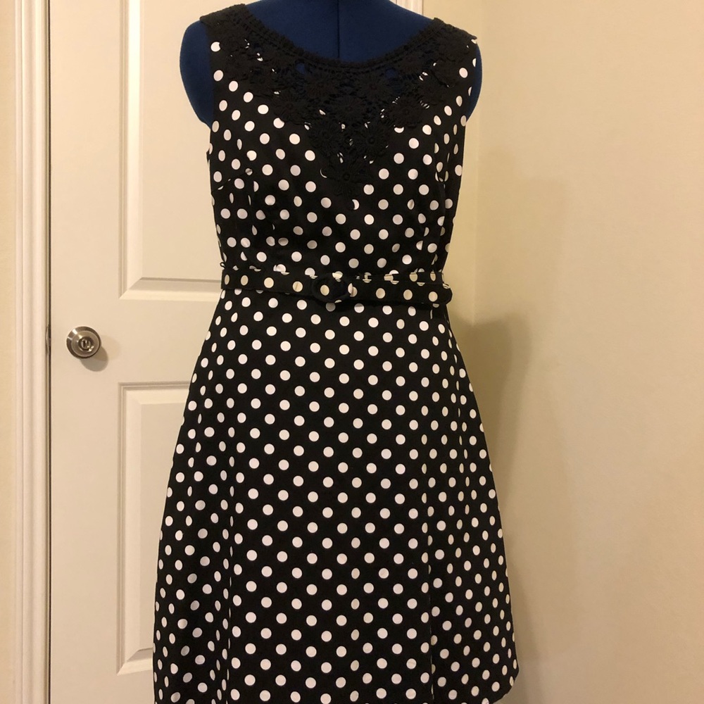 Black and white polkadotted dress.